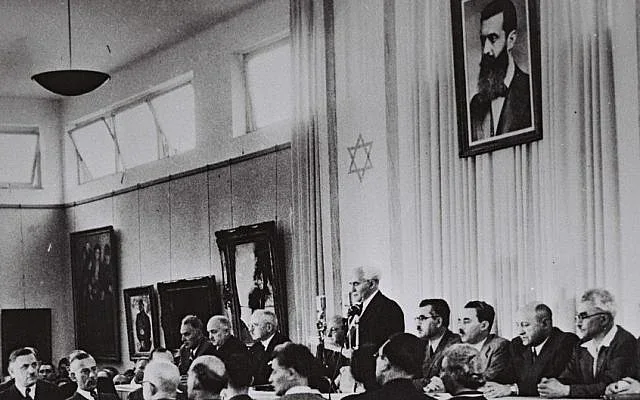David Ben-Gurion reads the Declaration of Independence in the Tel Aviv Museum Hall on May 14, 1948.