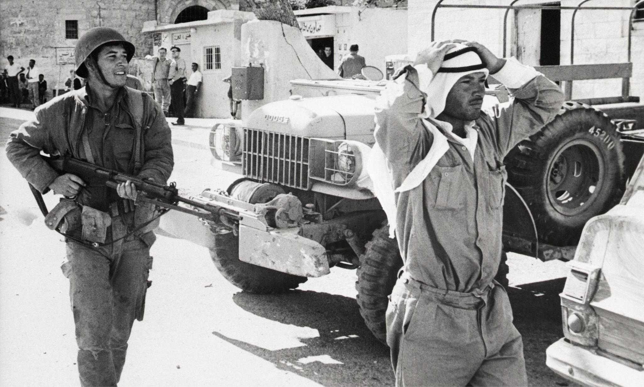 Israeli soldier with captured Jordanian prisoner in Bethlehem, 1967