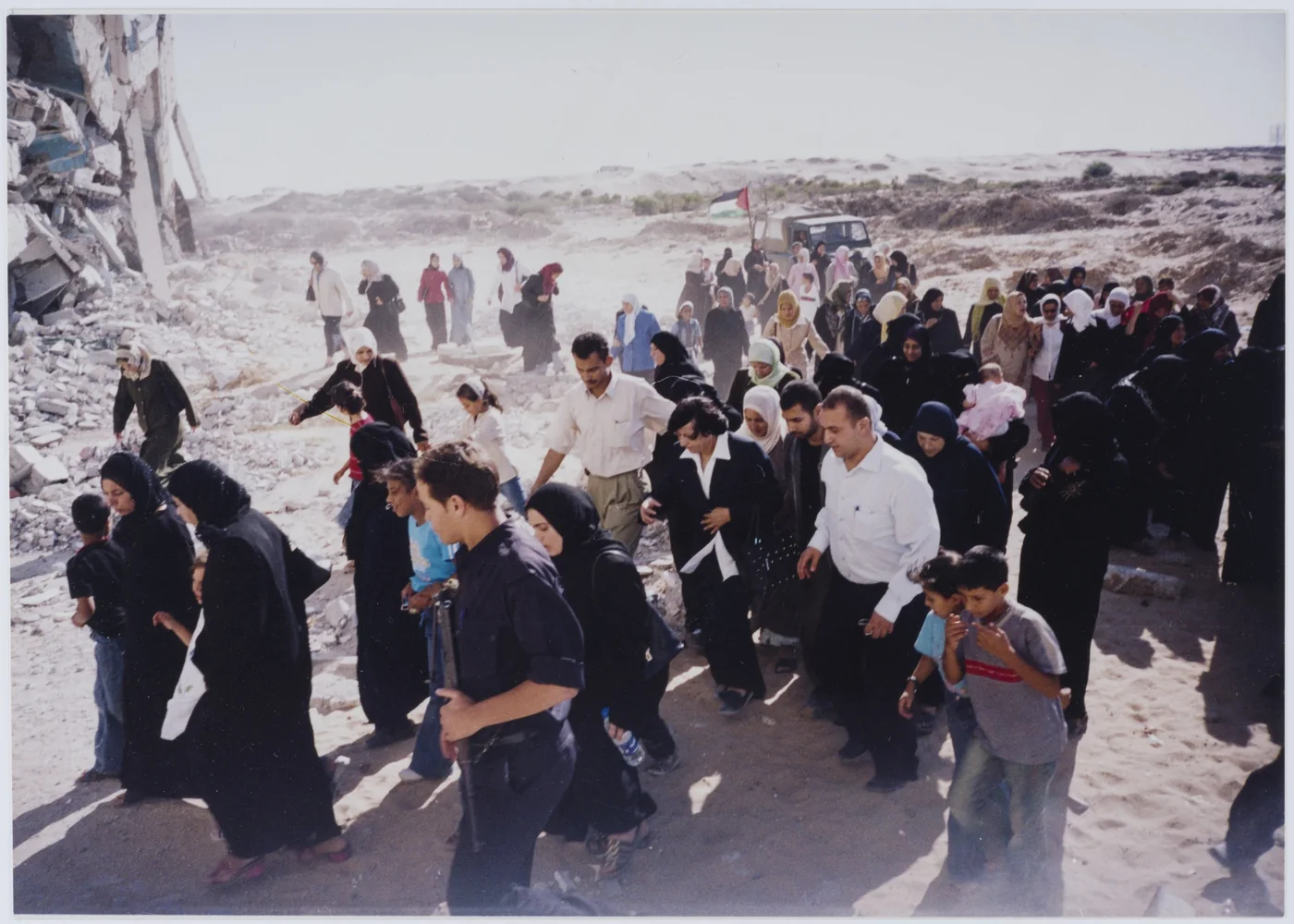 The Palestinian Negotiating Team accompanied by local residents Visits Gaza from which Israel withdrew, 2005.