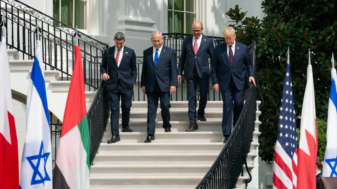 President Donald Trump, Minister of Foreign Affairs of Bahrain Dr. Abdullatif bin Rashid Al-Zayani, Israeli Prime Minister Benjamin Netanyahu and Minister of Foreign Affairs for the United Arab Emirates Abdullah bin Zayed Al Nahyan walk to sign the Abraham Accords